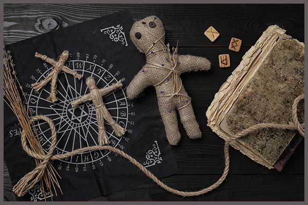 Casts voodoo death spells